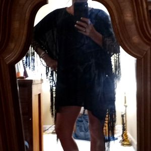 Poncho type top/swim suit cover up or wear as a dress